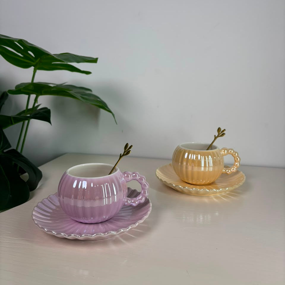 Ribbed purple & yellow ceramic teacup