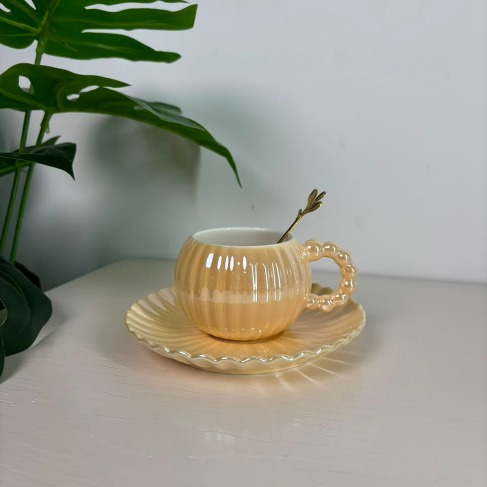 Ribbed purple & yellow ceramic teacup